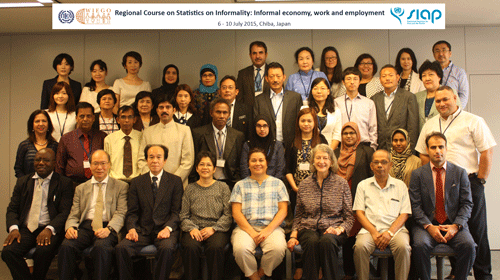 a group photo of people in a room